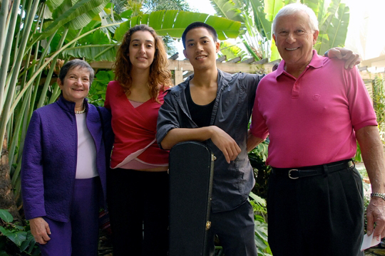 Esta and Lewis Ress, pictured with students participating in the Ress Family Hospital Performance Project.